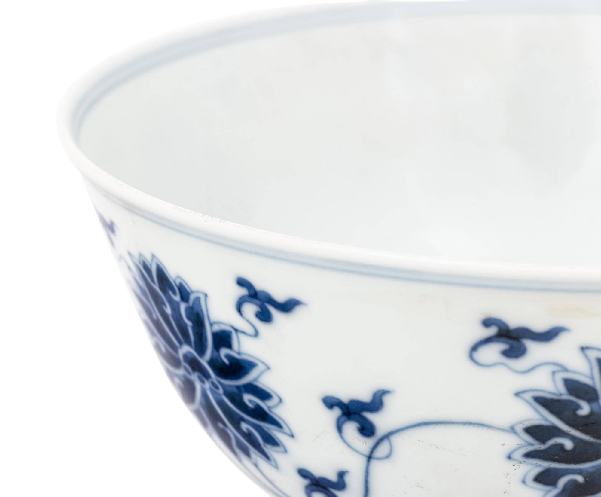 Four Chinese Blue and White Porcelain 'Lotus' Bowls