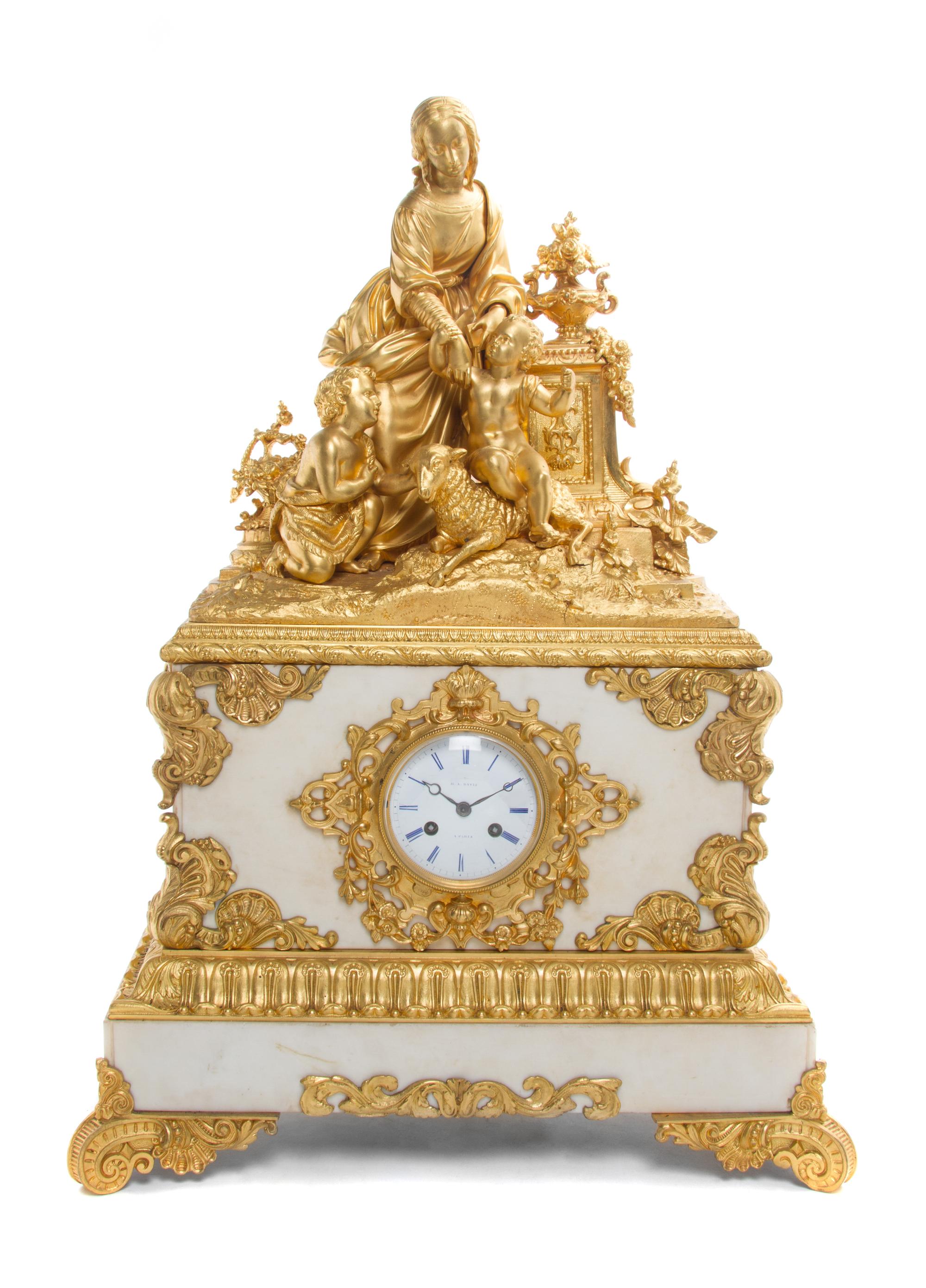 A Louis XVI Style Gilt Bronze Mounted Mantel Clock Height 27 1/2 inches.