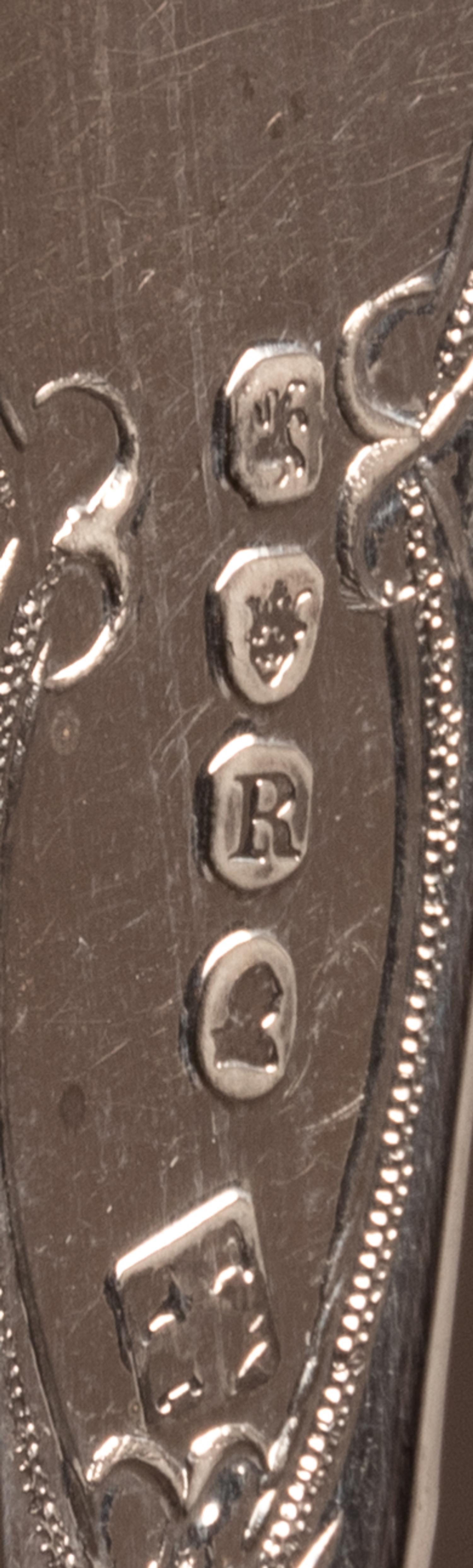 Fourteen George III Silver Berry Spoons