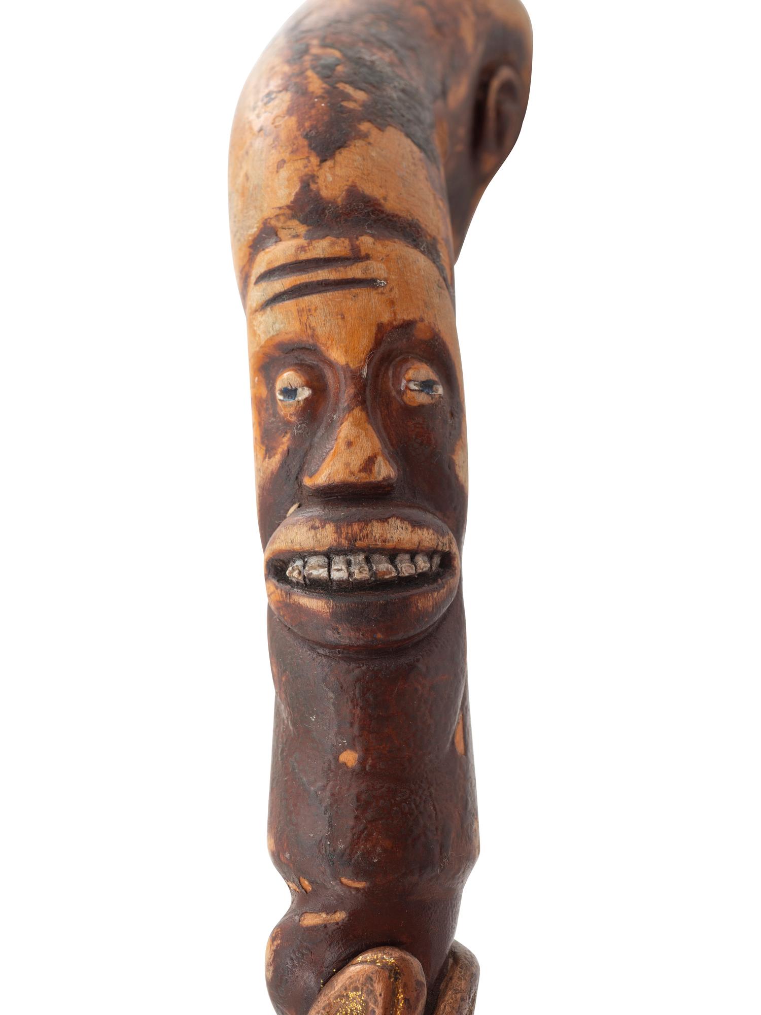 A Folk Art Carved and Painted Wood Jazz Walking Stick