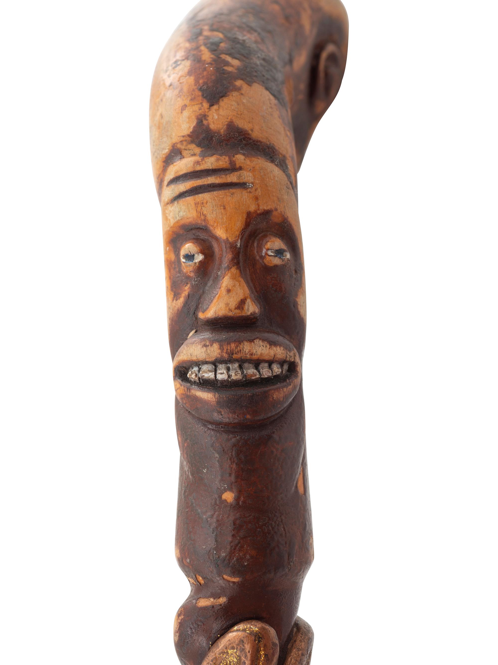 A Folk Art Carved and Painted Wood Jazz Walking Stick