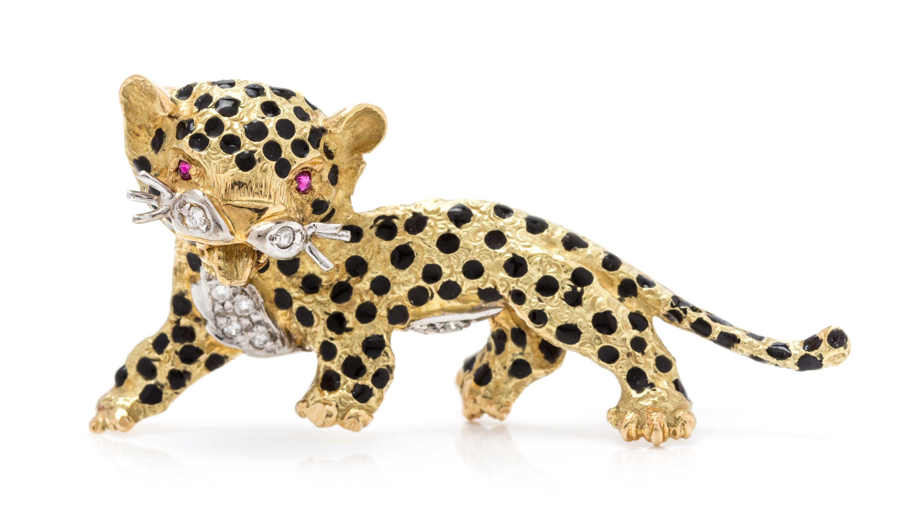 An 18 Karat Yellow Gold, Diamond, Ruby and Enamel Leopard Brooch, 6.40 dwts.