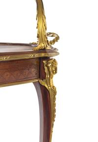 A Louis XV Style Gilt Bronze and Porcelain Mounted Two-Tier Serving Table