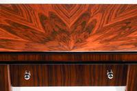 An Art Deco Style Part-Ebonized Rosewood Writing Table