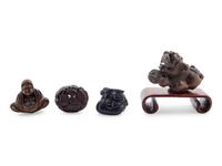 Four Japanese Carved Wood Netsuke