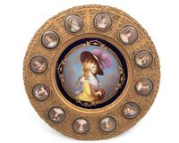A Continental Porcelain Portrait and a Set of Twelve Similar Medallions in a Gilt Bronze Plaque