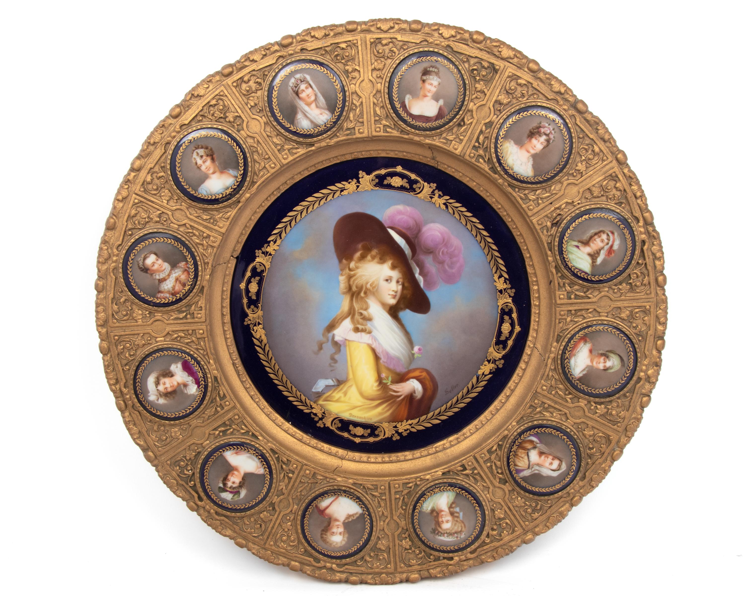 A Continental Porcelain Portrait and a Set of Twelve Similar Medallions in a Gilt Bronze Plaque