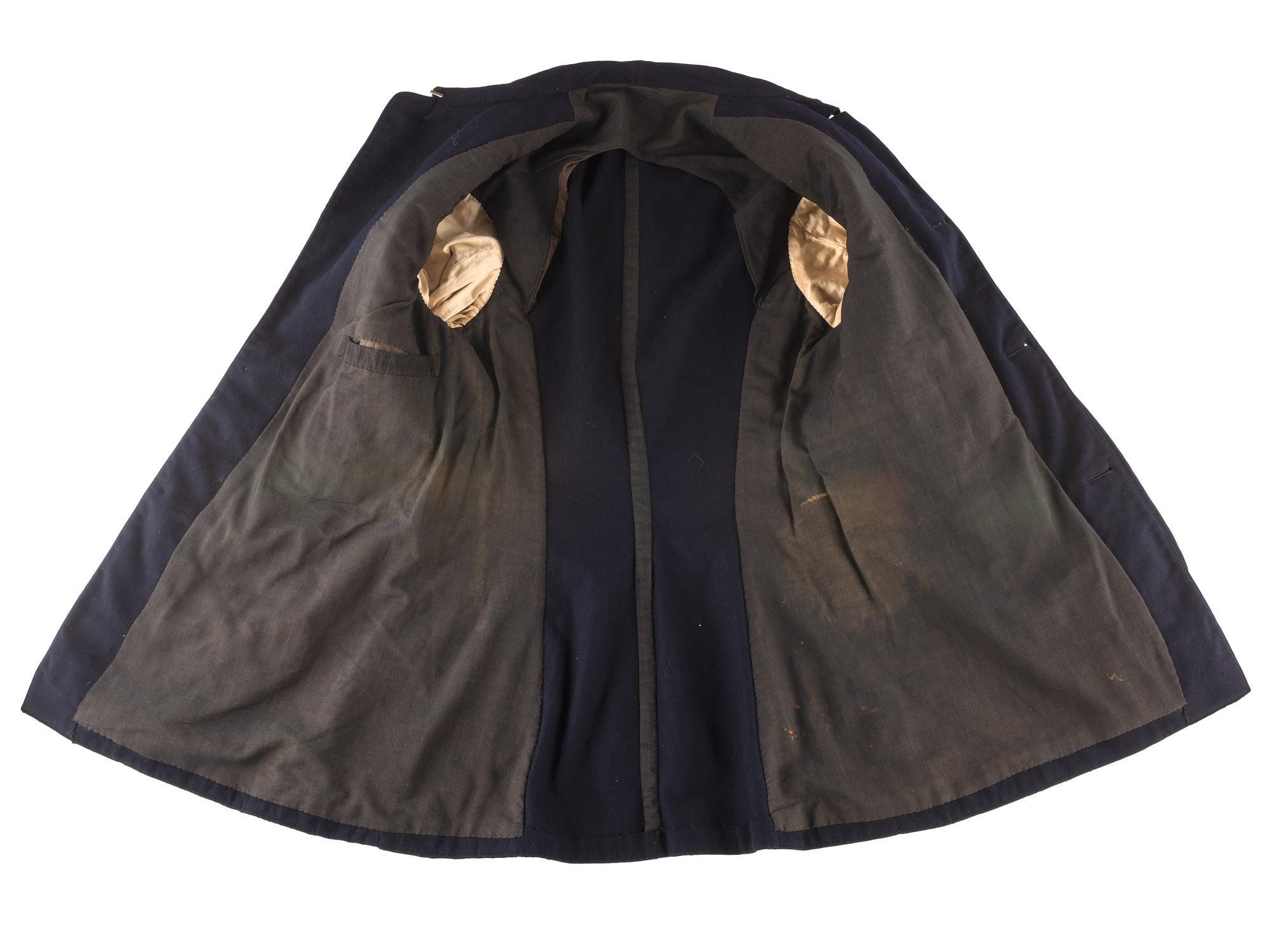 [CIVIL WAR]. Private purchase officer's sack coat, kepi, and carpet bag identified to Lieutenant Albert C. Sparks, Co. B, 37th Massachusetts Volunteers.