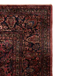 A Sarouk Wool Rug — 20th Century