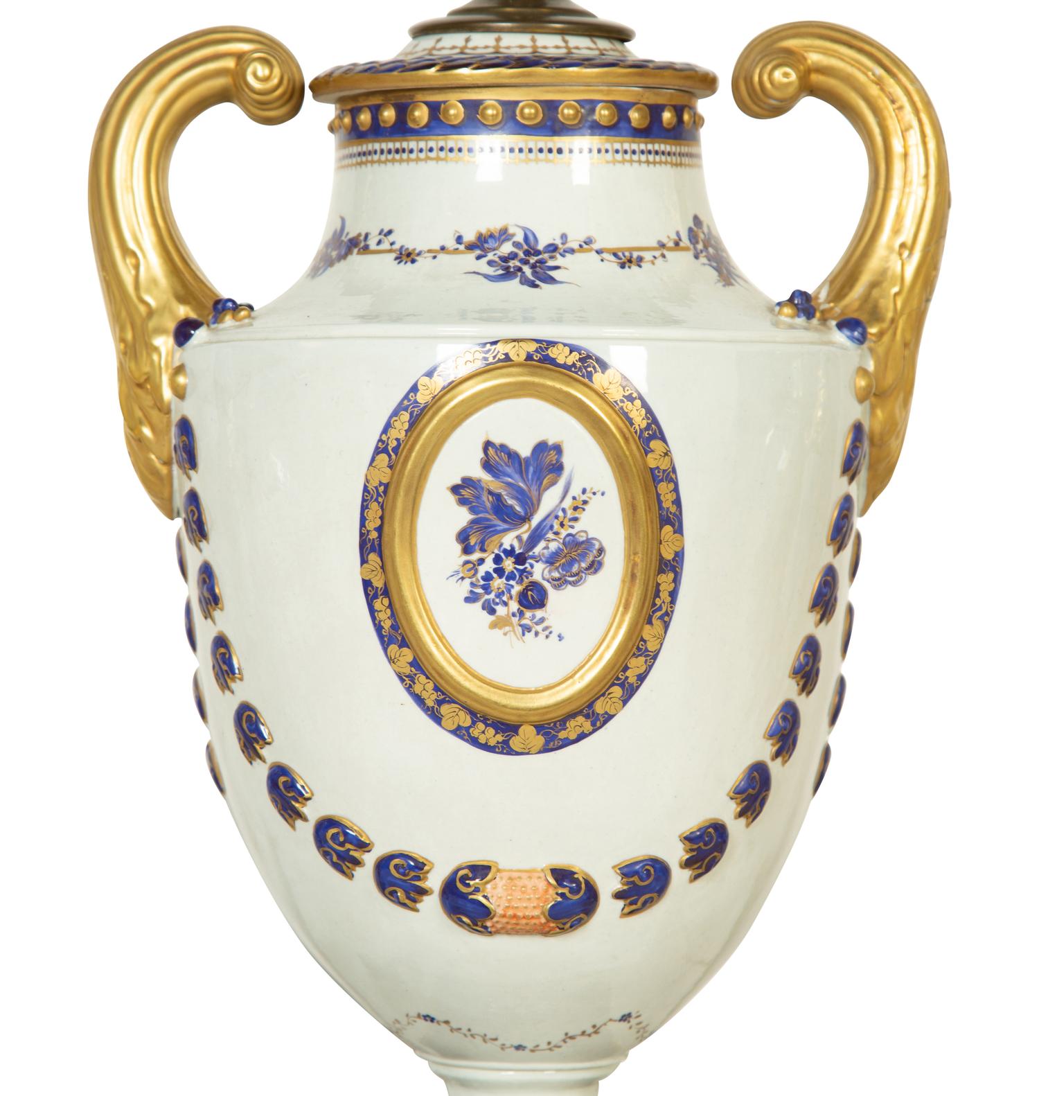 A Pair of Paris Porcelain Lamps and an Additional Lamp