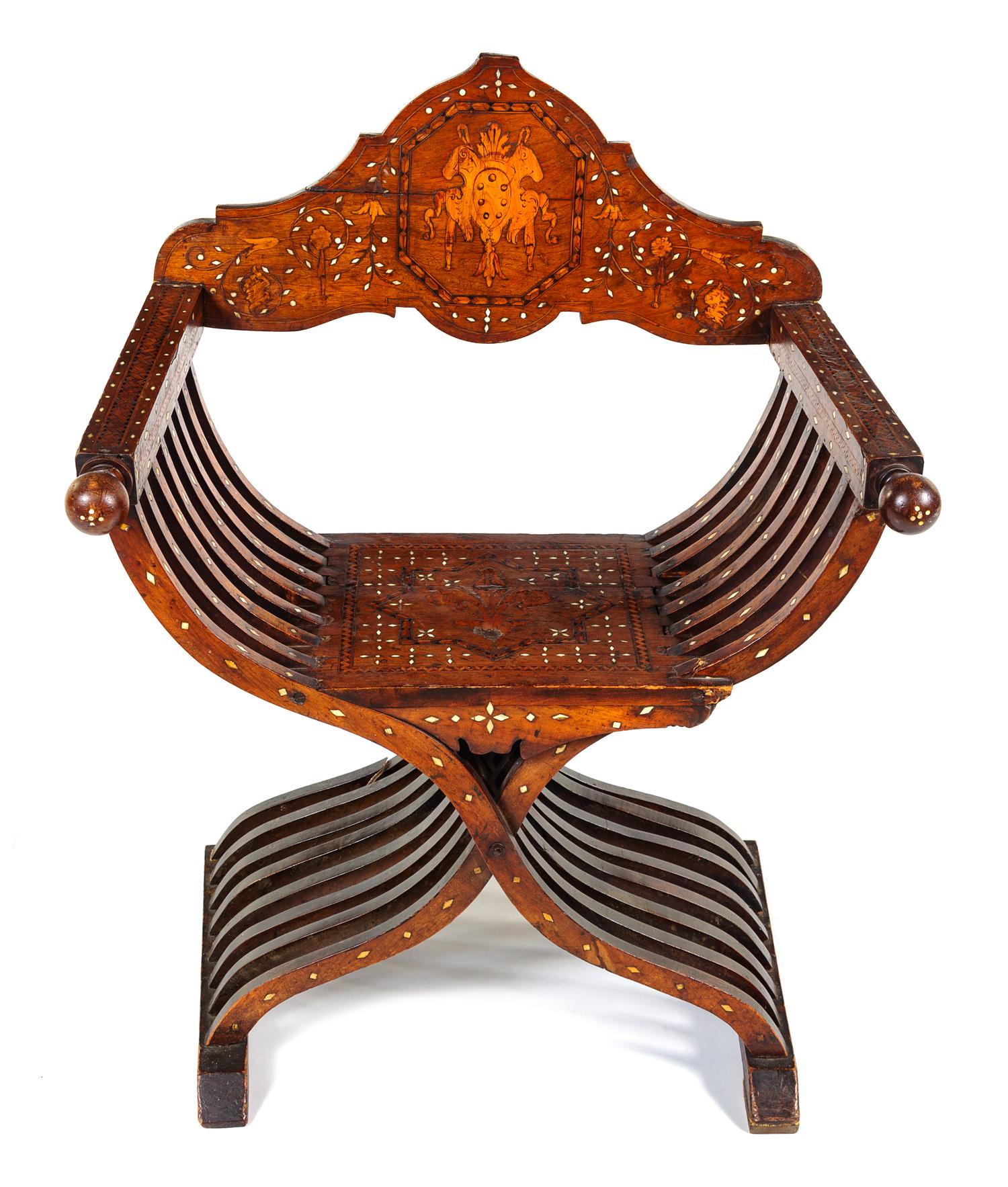An Italian Mother-of-Pearl, Basswood and Ebony Inlaid Walnut Savonarola Chair Height 36 x width 28 1/2 x depth 20 inches. — LATE 19TH/EARLY 20TH CENTURY