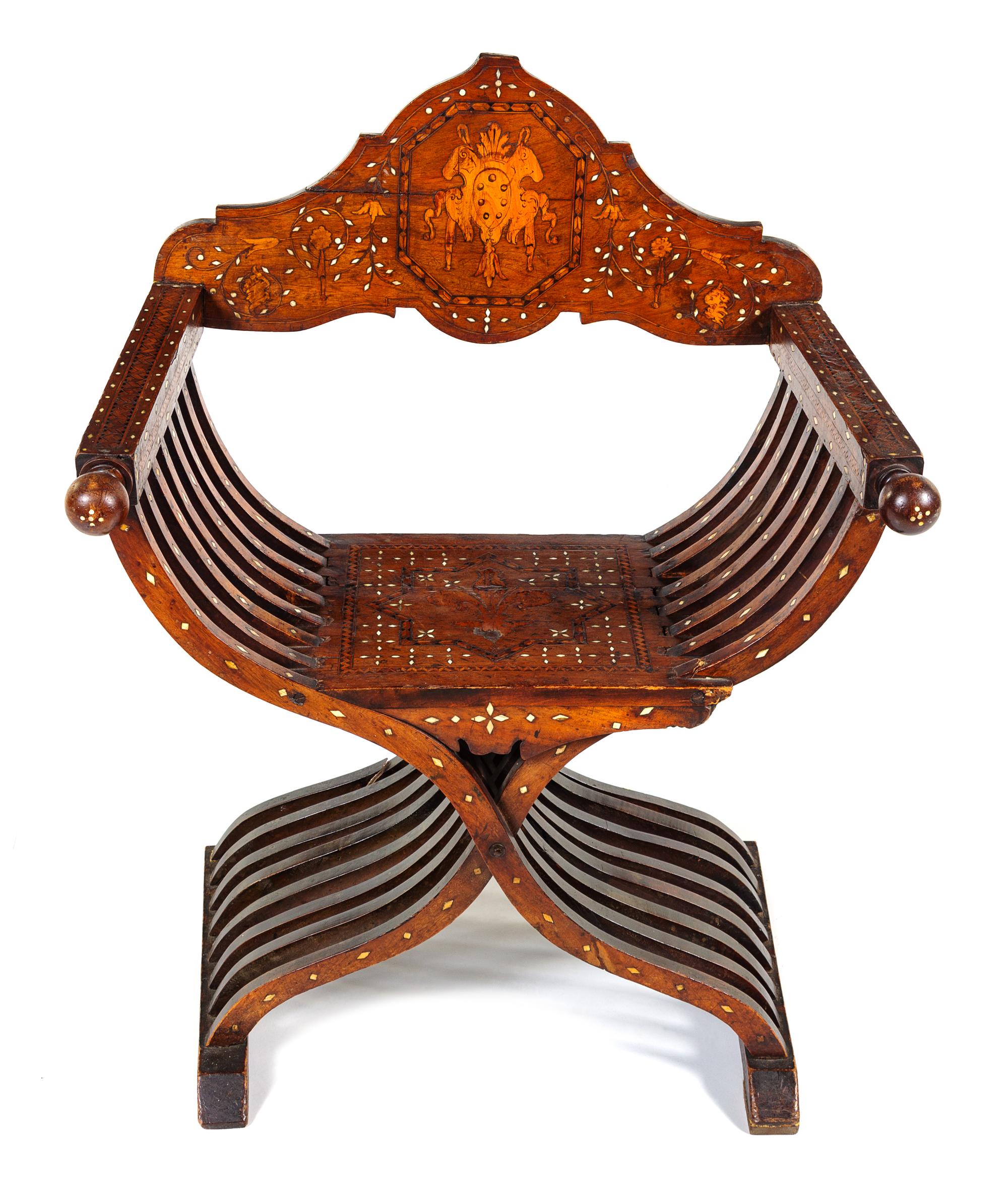An Italian Mother-of-Pearl, Basswood and Ebony Inlaid Walnut Savonarola Chair Height 36 x width 28 1/2 x depth 20 inches. — LATE 19TH/EARLY 20TH CENTURY