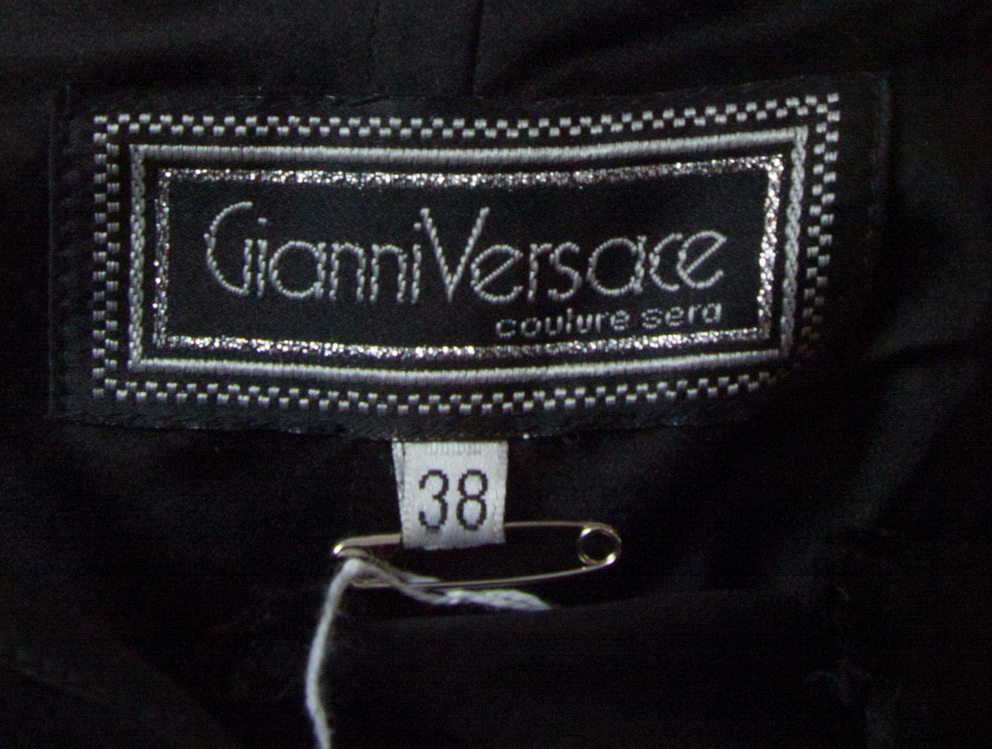 A Gianni Versace Black Column Strapless Gown, Size 38.