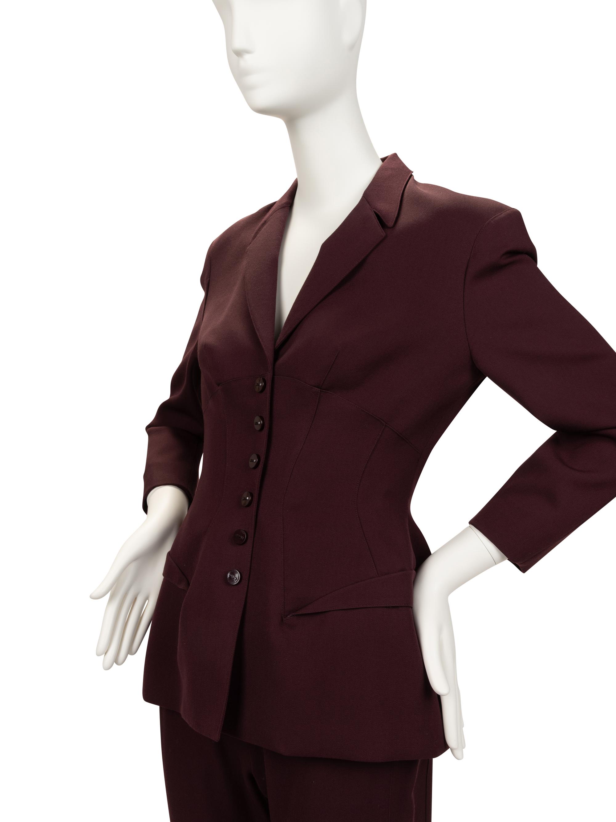 Three Designer Items: One Gianni Versace Dress, One Thierry Mugler Pant Suit, One Claude Montana Skirt Suit, 1980-90s