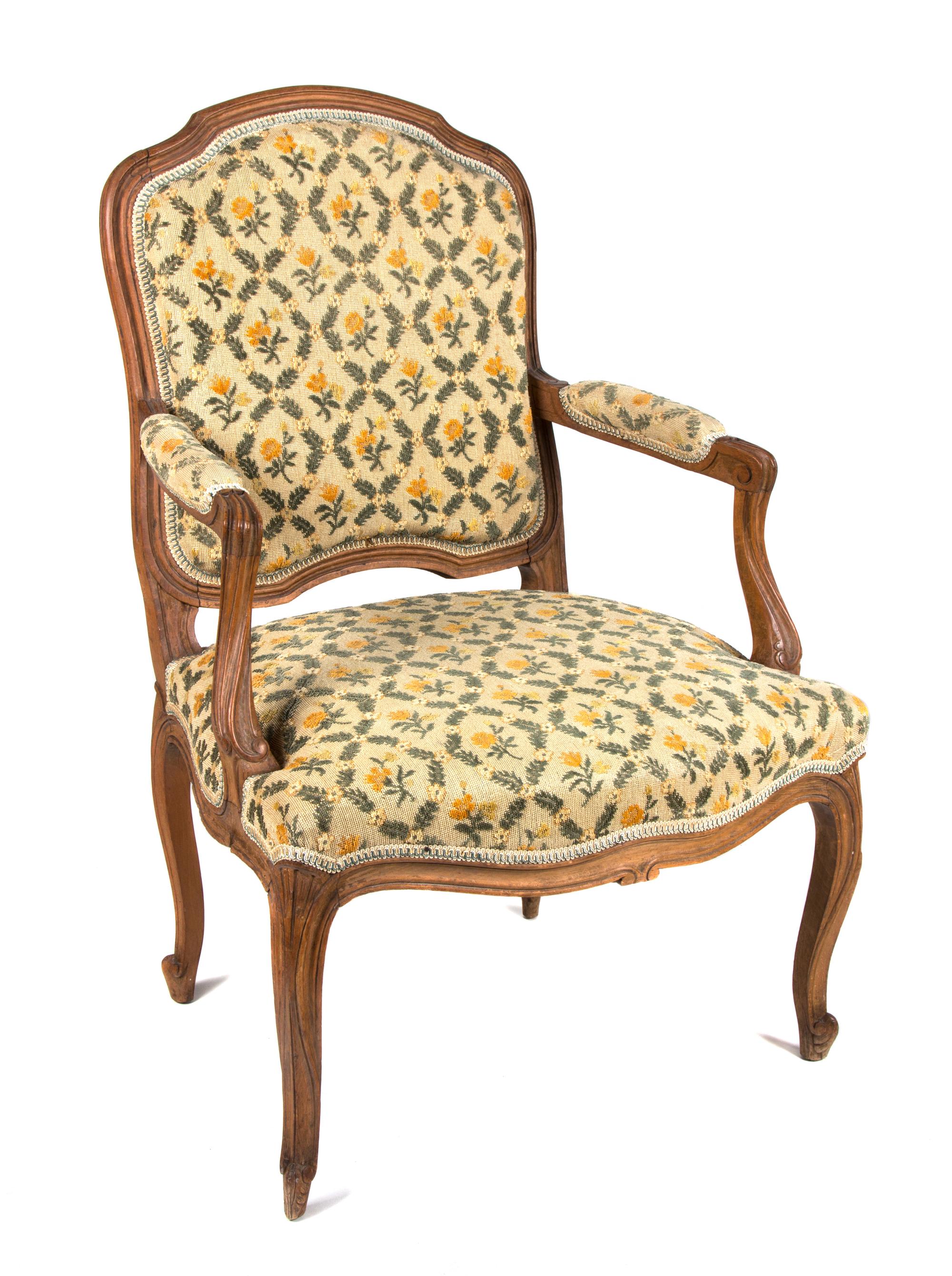 A Louis XV Style Walnut Fauteuil Height 37 1/4 inches. — 19TH CENTURY