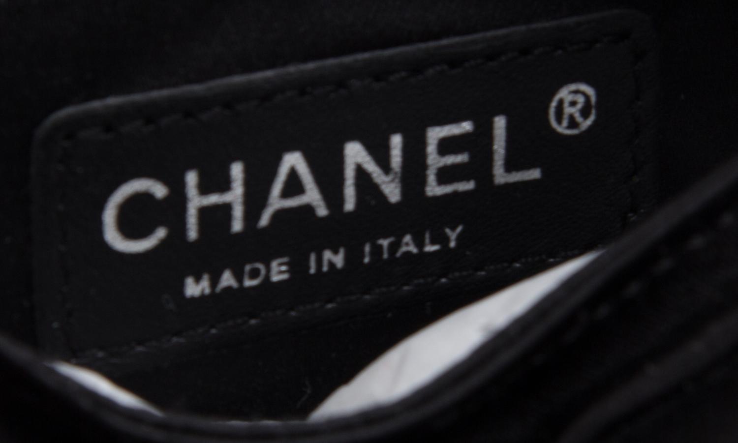 A Chanel Black Satin Partially Quilted Clutch, 11.5" x 5" x .5".