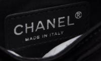 A Chanel Black Satin Partially Quilted Clutch, 11.5" x 5" x .5".