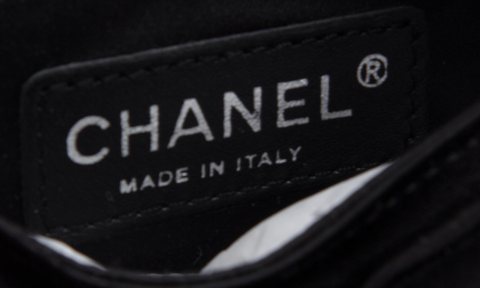 A Chanel Black Satin Partially Quilted Clutch, 11.5" x 5" x .5".