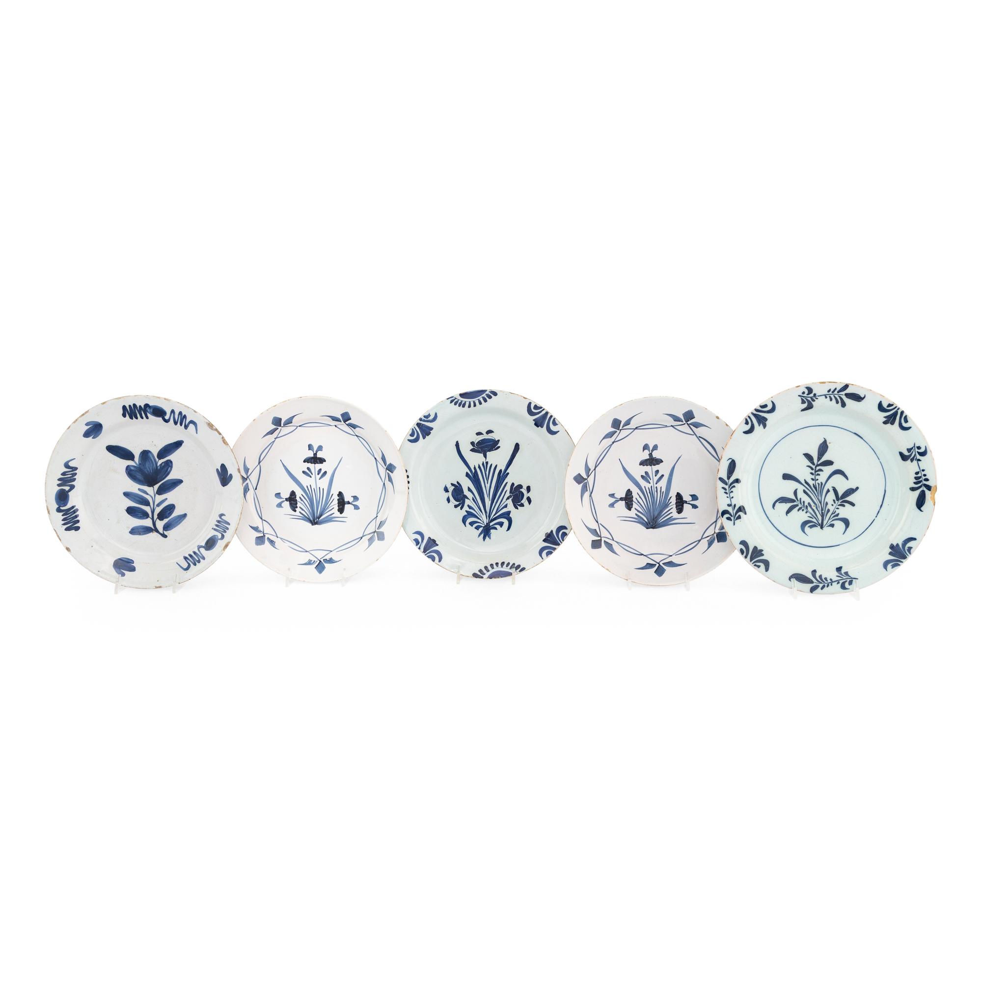 A Collection of Five Delft Blue and White Decorated Plates