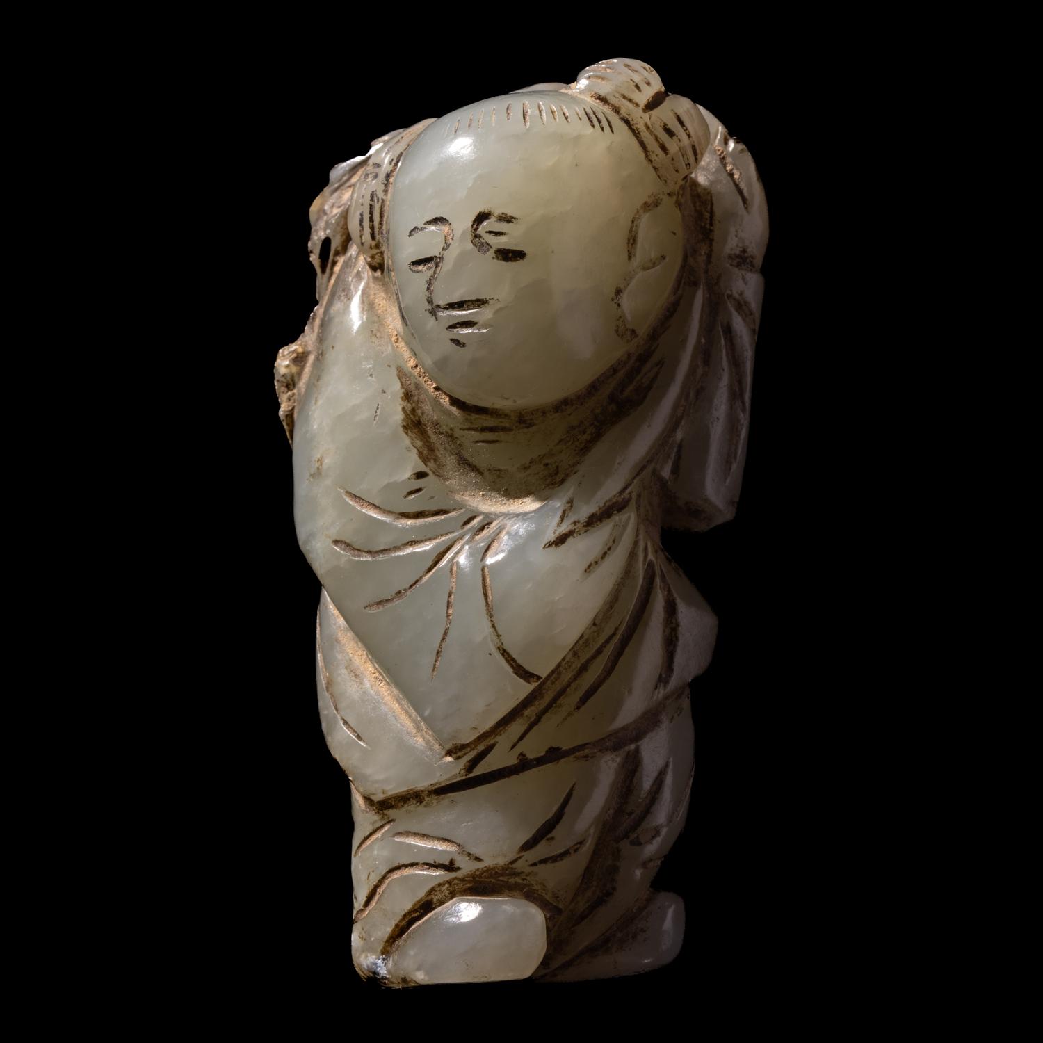 A Small Chinese Celadon Jade Figure of a Boy