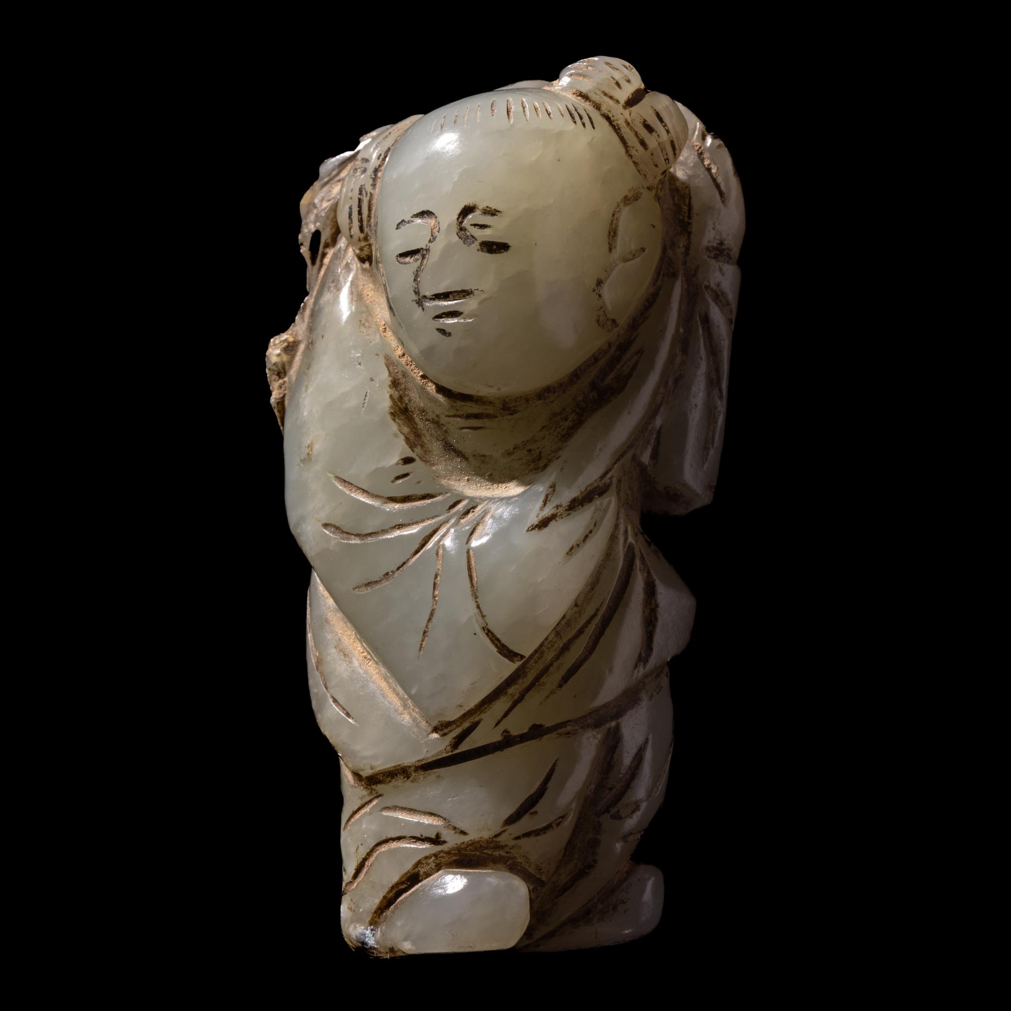 A Small Chinese Celadon Jade Figure of a Boy