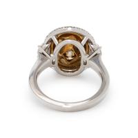FANCY DARK YELLOWISH BROWN DIAMOND AND DIAMOND RING