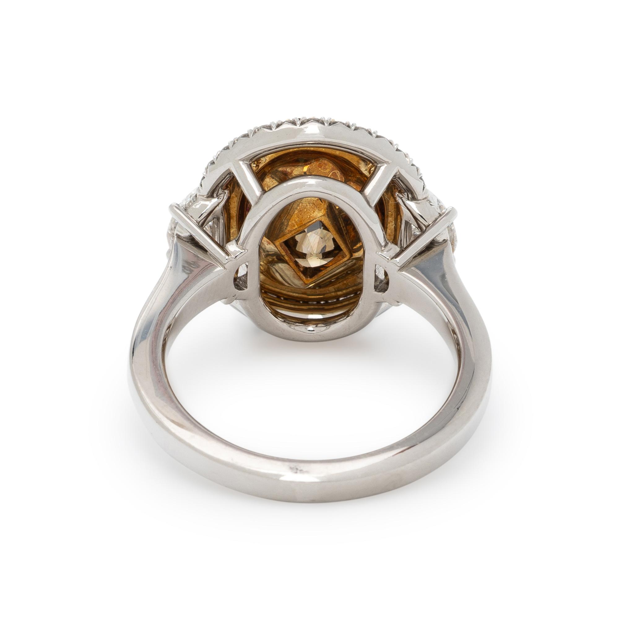 FANCY DARK YELLOWISH BROWN DIAMOND AND DIAMOND RING