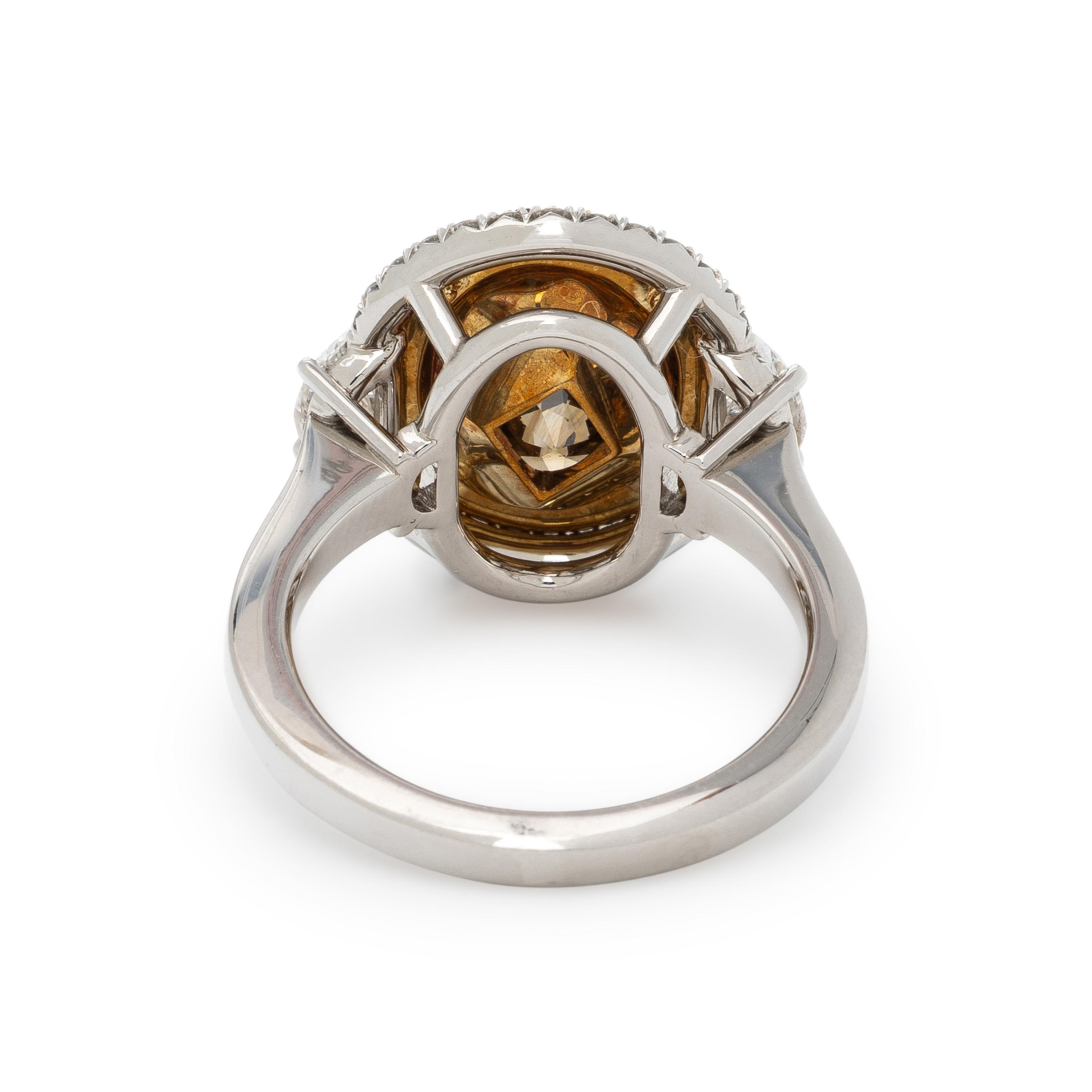 FANCY DARK YELLOWISH BROWN DIAMOND AND DIAMOND RING