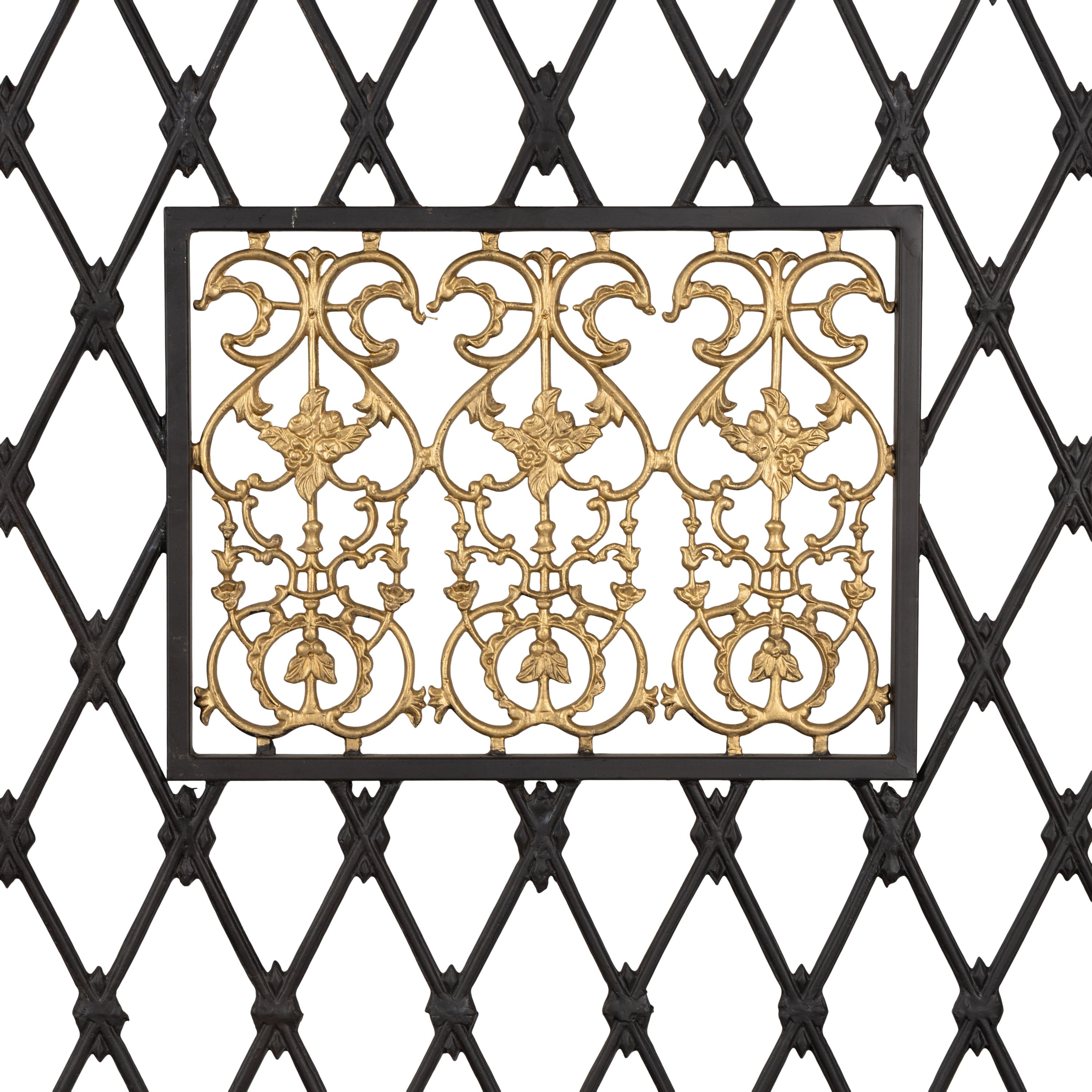A Pair of Large Parcel Gilt Iron Gates