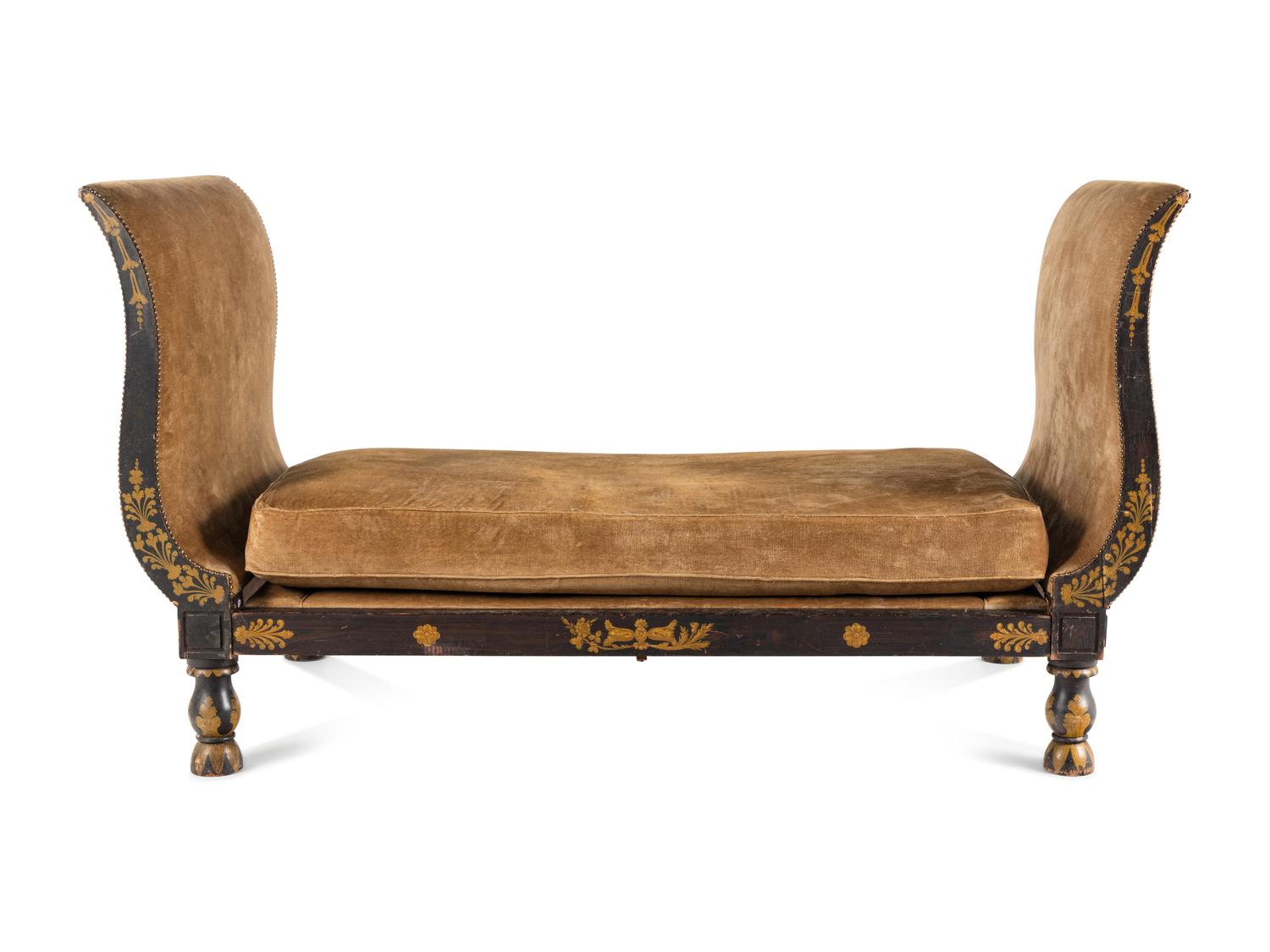 An Empire Ebonized and Parcel Gilt Daybed