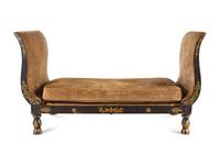 An Empire Ebonized and Parcel Gilt Daybed