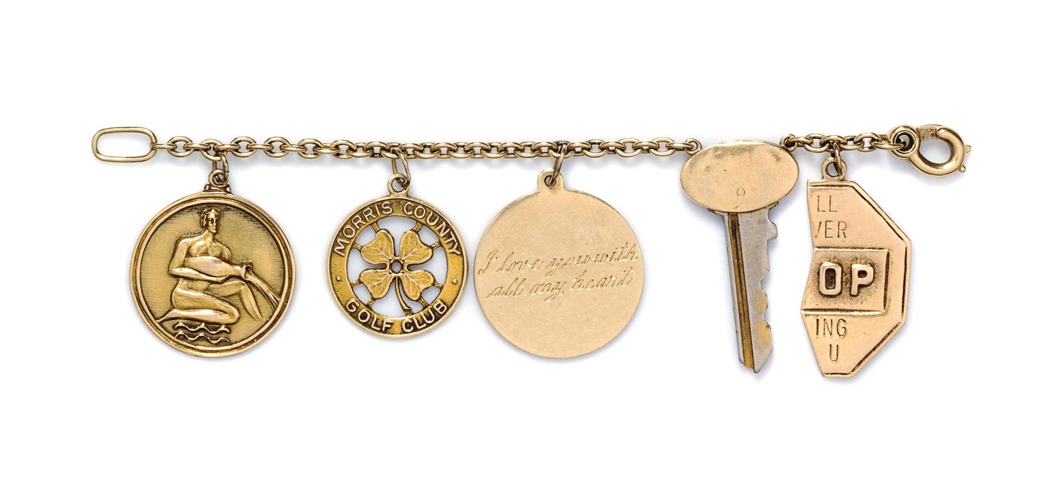 A 14 Karat Yellow Gold Charm Bracelet, 19.90 dwts.