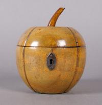 An English Fruitwood Tea Caddy, Height 5 1/4 inches.