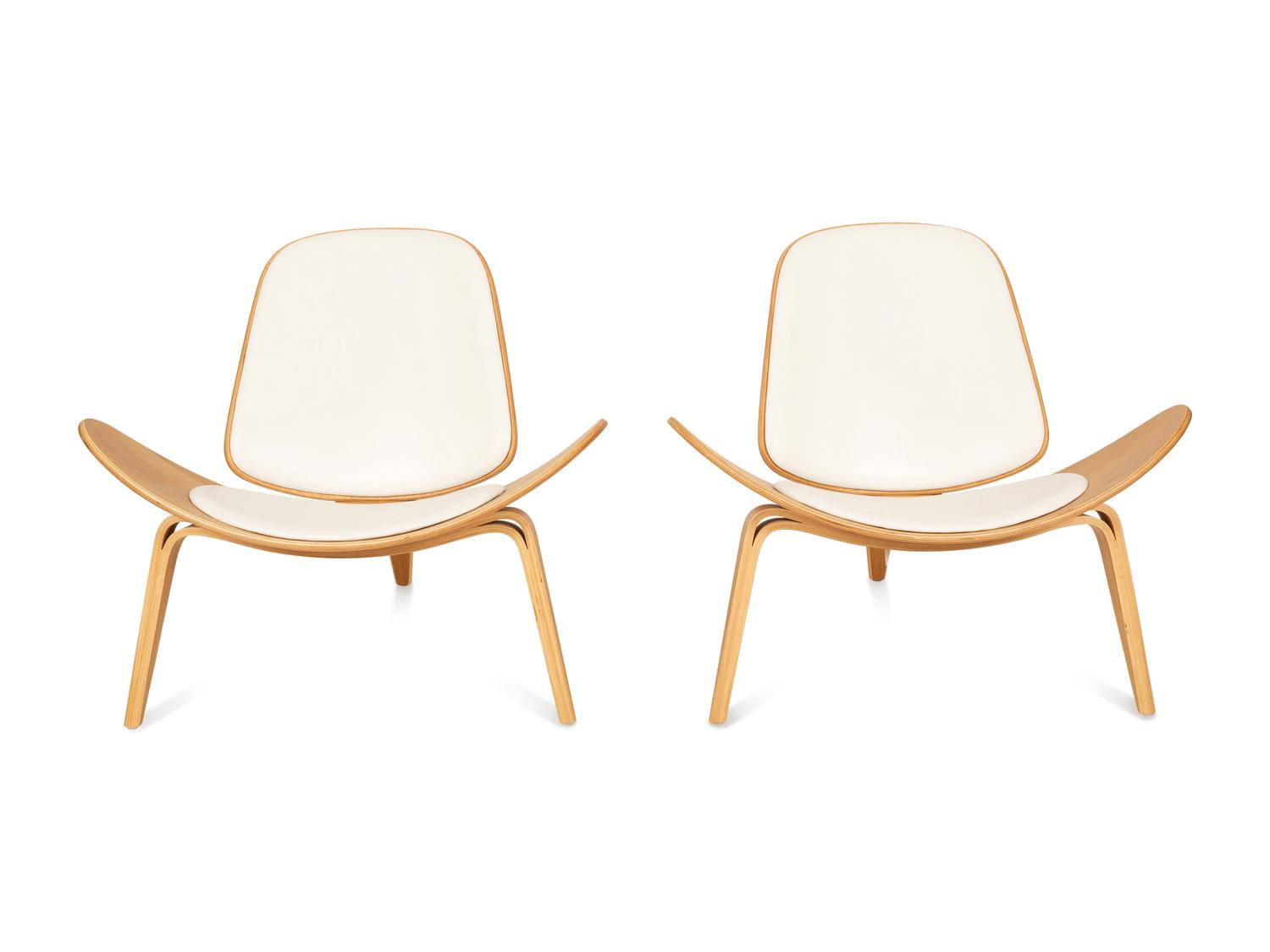 A Pair of Italian Walnut and Leather Tripod Chairs