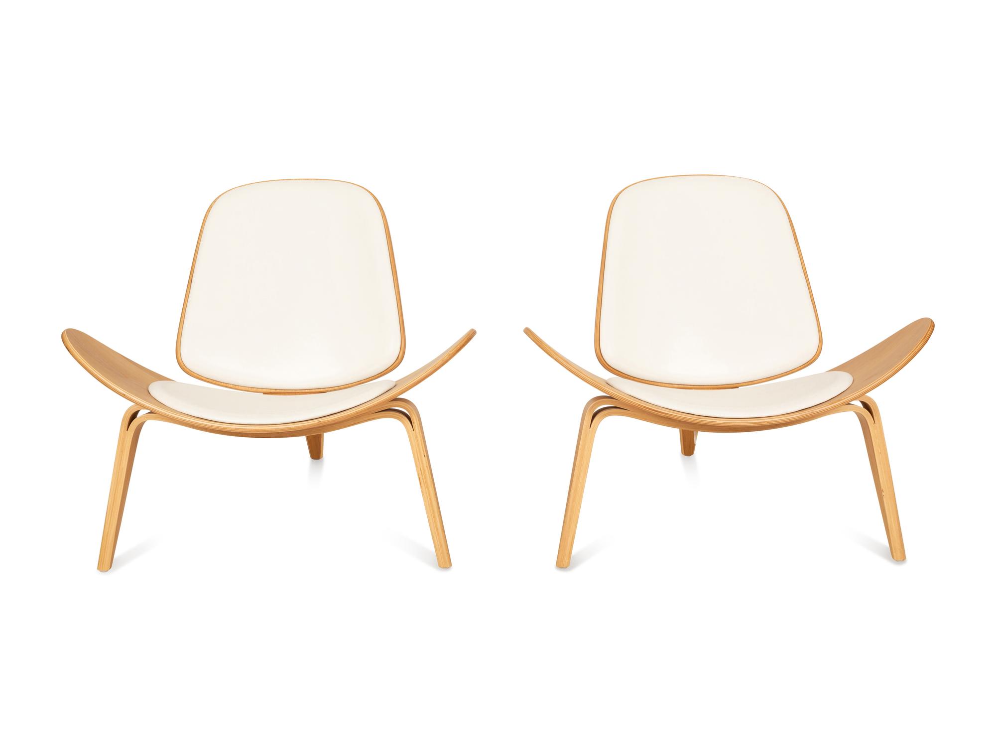 A Pair of Italian Walnut and Leather Tripod Chairs
