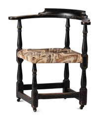 A William and Mary Black Painted and Parcel Gilt Roundabout Corner Chair