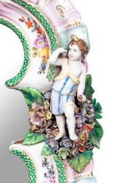 A Pair of Continental Porcelain Girandole Mirrors