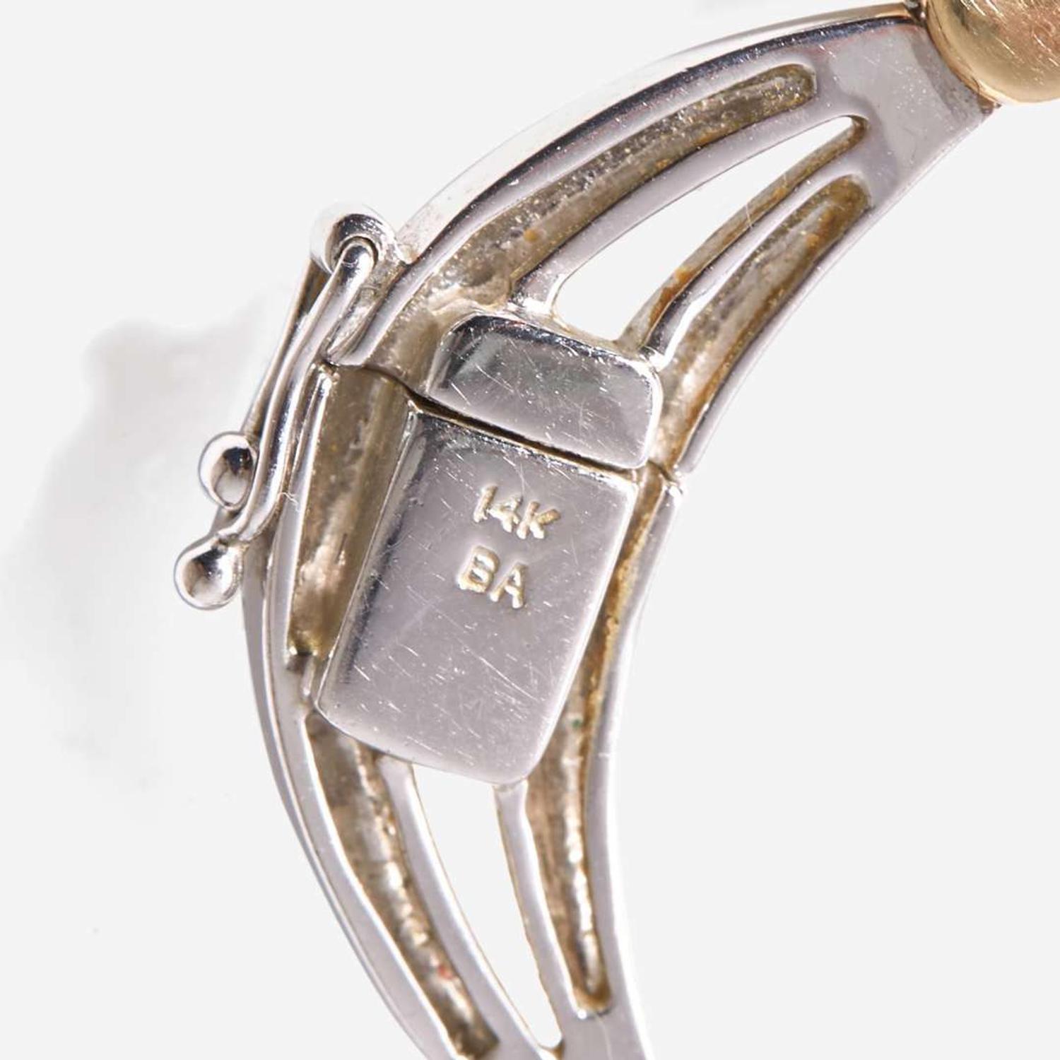 A Two-Tone 14K Gold and Diamond Necklace