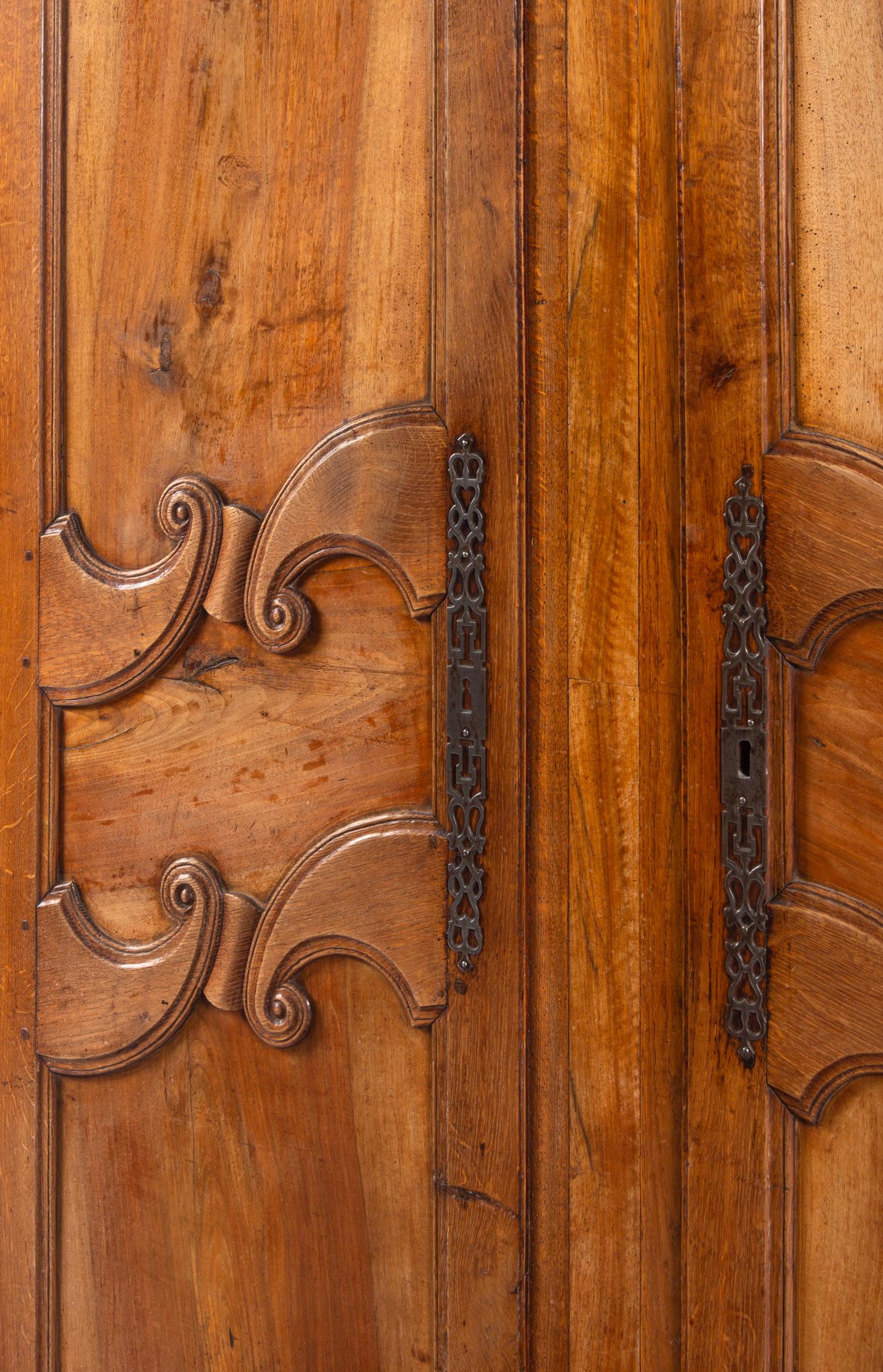 A French Provincial Walnut and Fruitwood Armoire