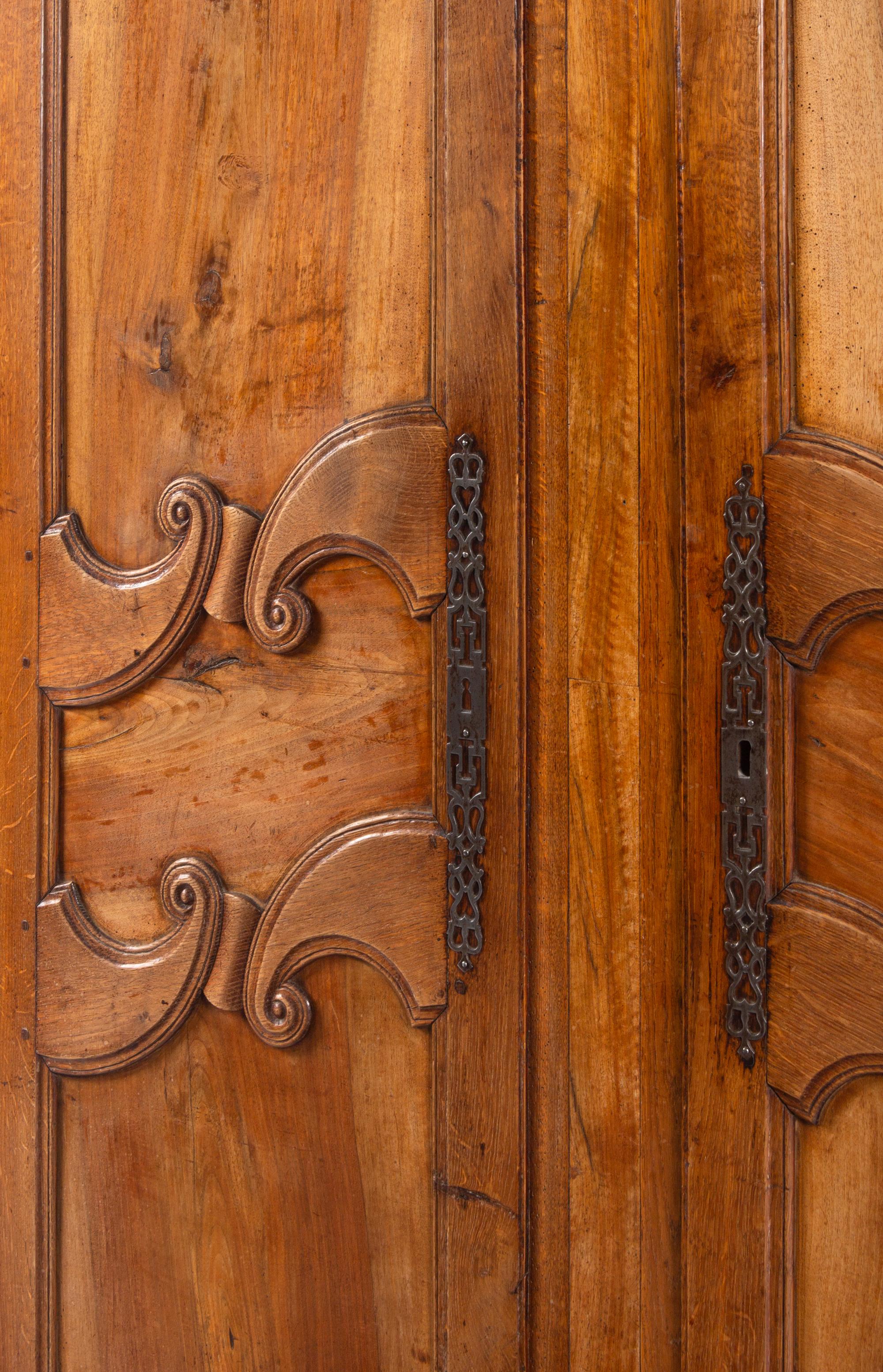A French Provincial Walnut and Fruitwood Armoire