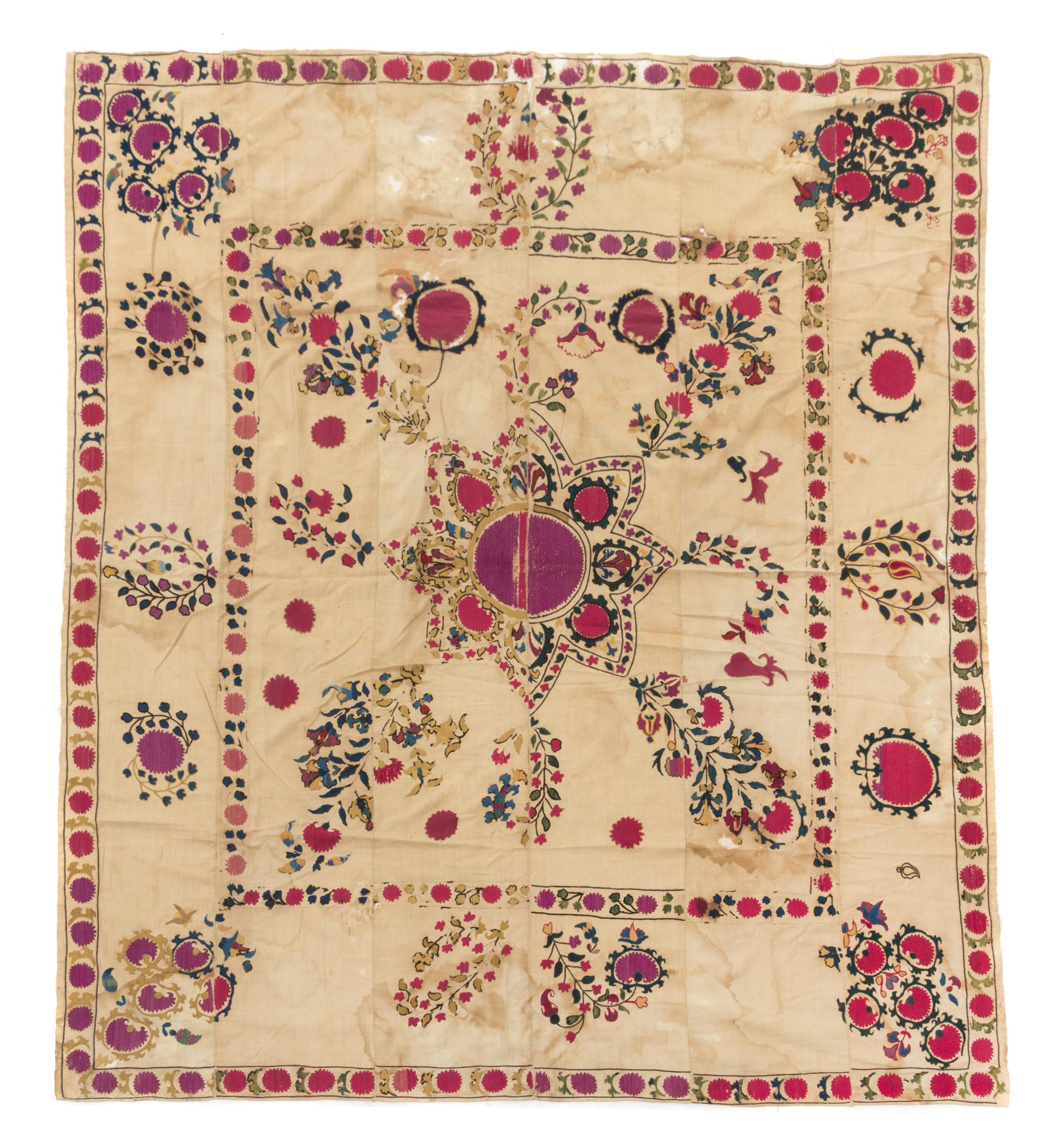 Three Suzani Embroideries Largest: 8 feet 7 1/4 inches x 6 feet 4 1/4 inches.