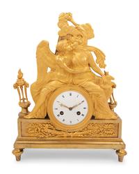 An Empire Gilt Bronze Figural Mantel Clock