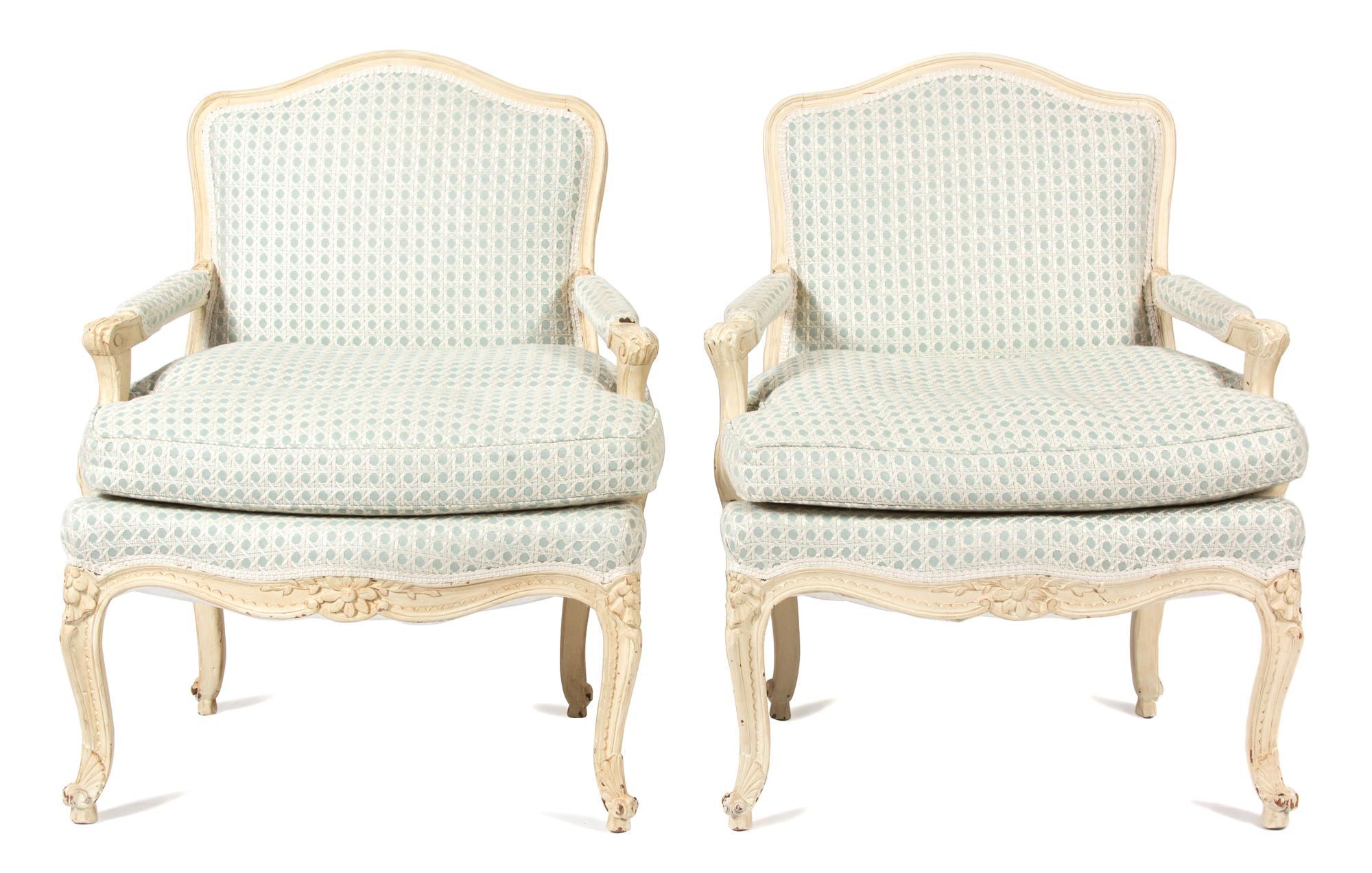 A Pair of Louis XV Style Carved and Painted Fauteuils Height 37 inches. — 20TH CENTURY