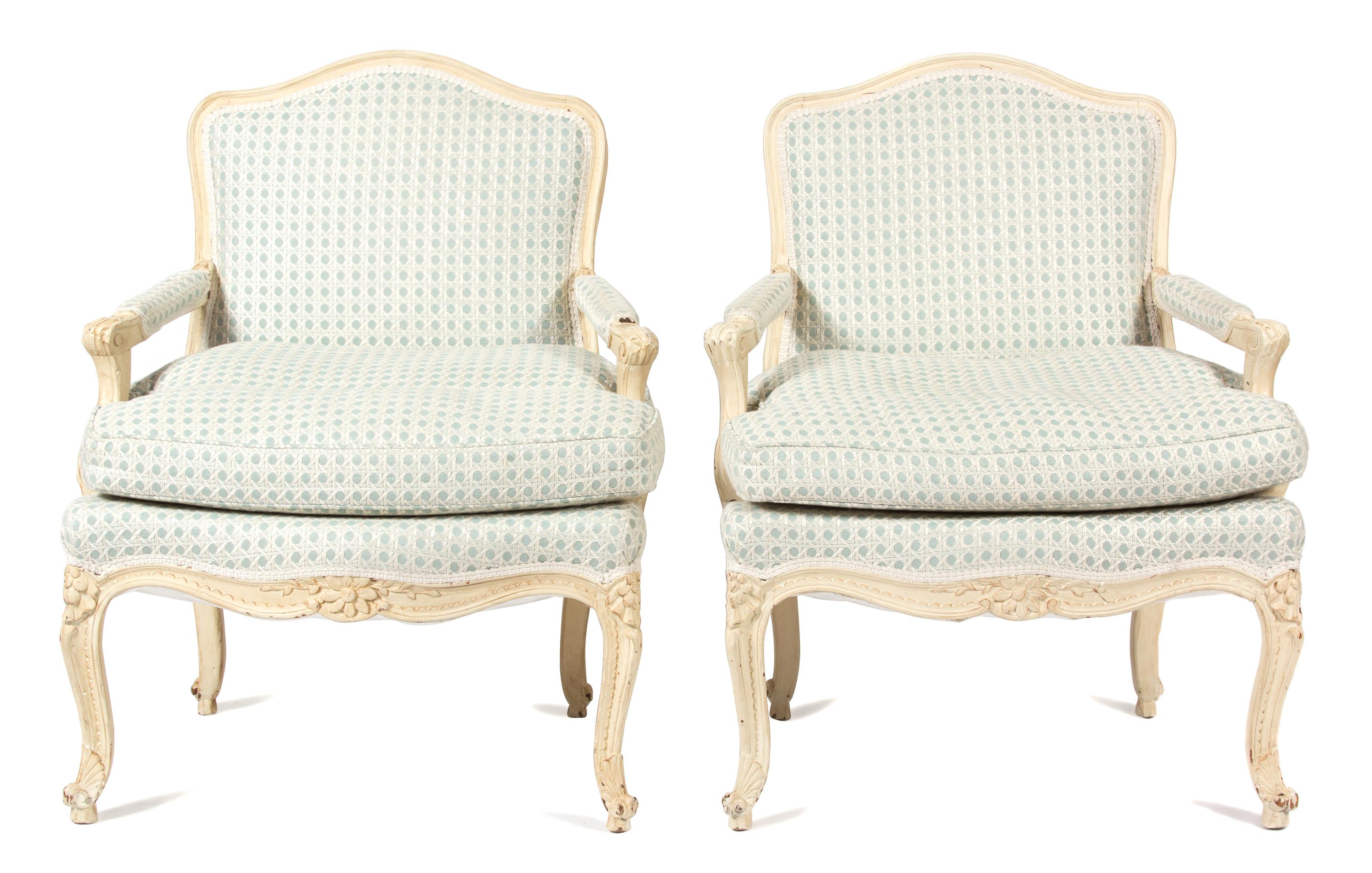 A Pair of Louis XV Style Carved and Painted Fauteuils Height 37 inches. — 20TH CENTURY