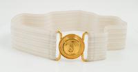 An Yves Saint Laurent White Stretch Belt, 34" x 2.25".