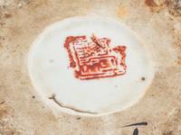 A Pair of Chinese 'Fu Lions' Porcelain Hat Stands