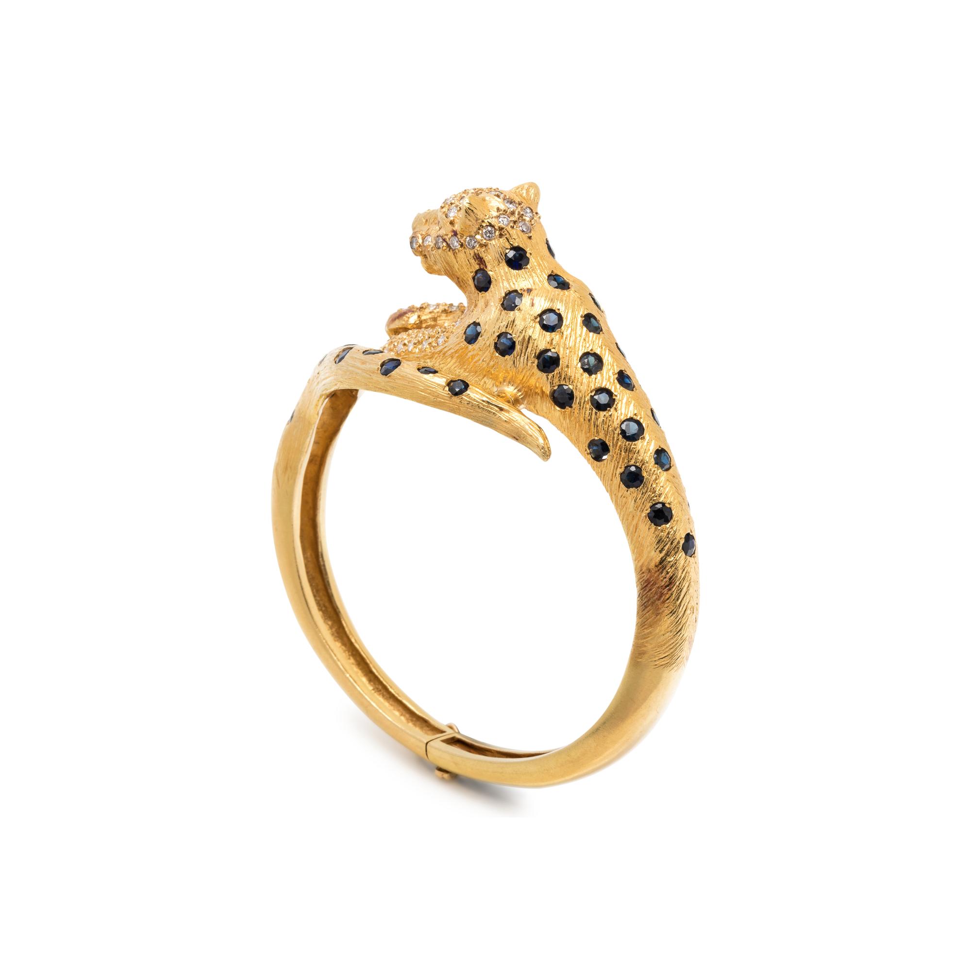 YELLOW GOLD, SAPPHIRE, DIAMOND AND RUBY LEOPARD BANGLE BRACELET