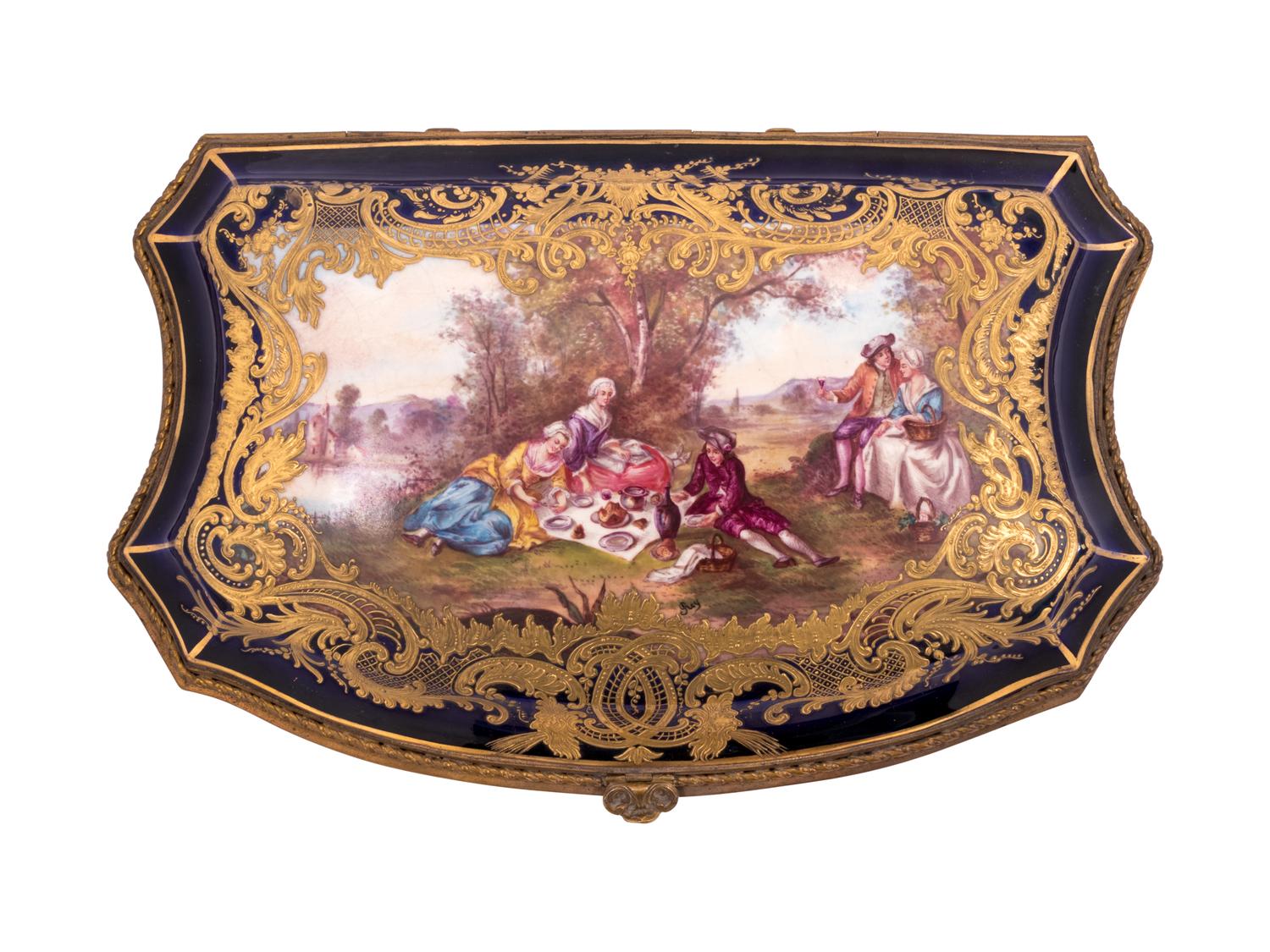 A Sèvres Style Painted and Parcel Gilt Porcelain Table Casket