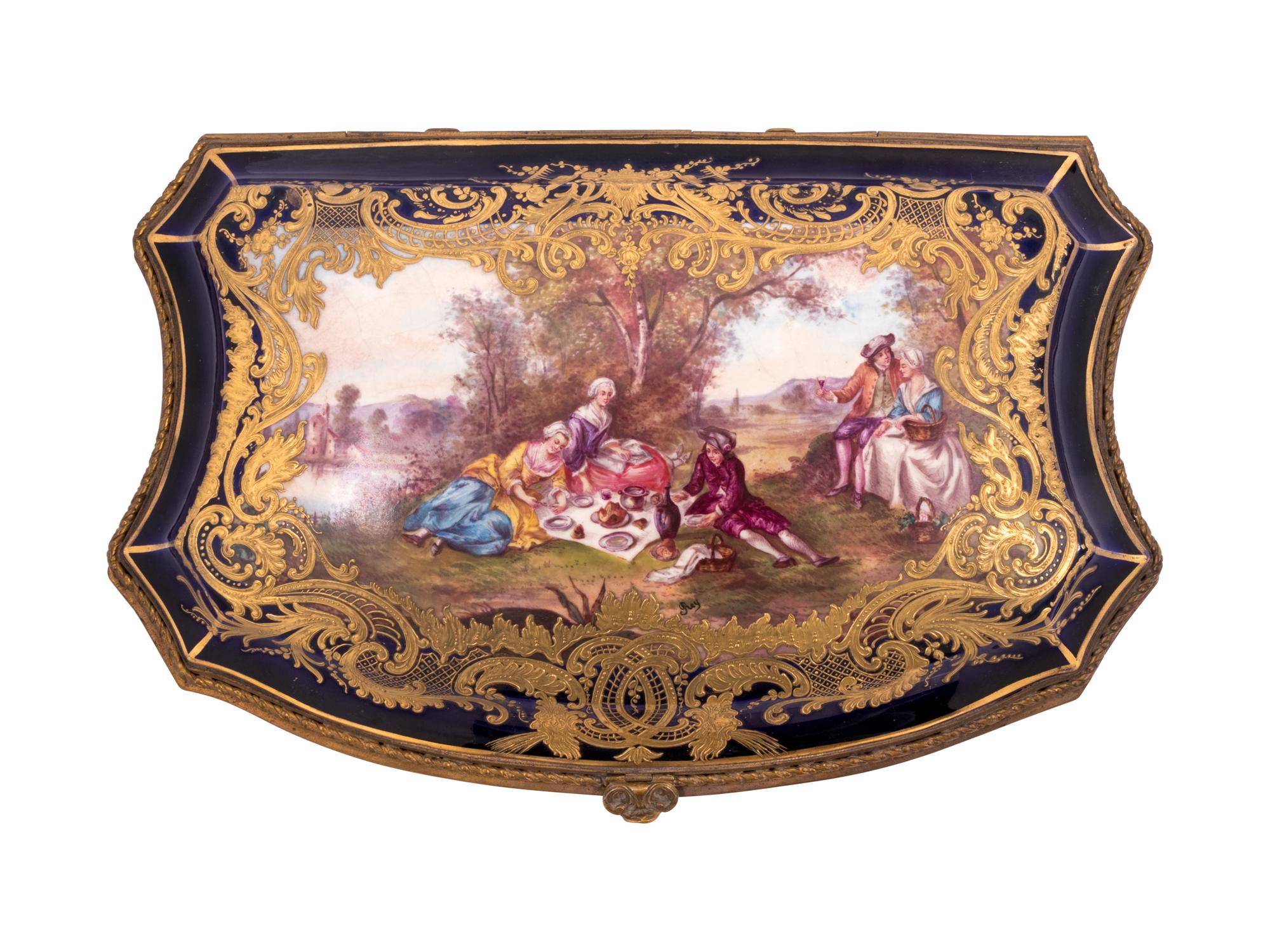 A Sèvres Style Painted and Parcel Gilt Porcelain Table Casket