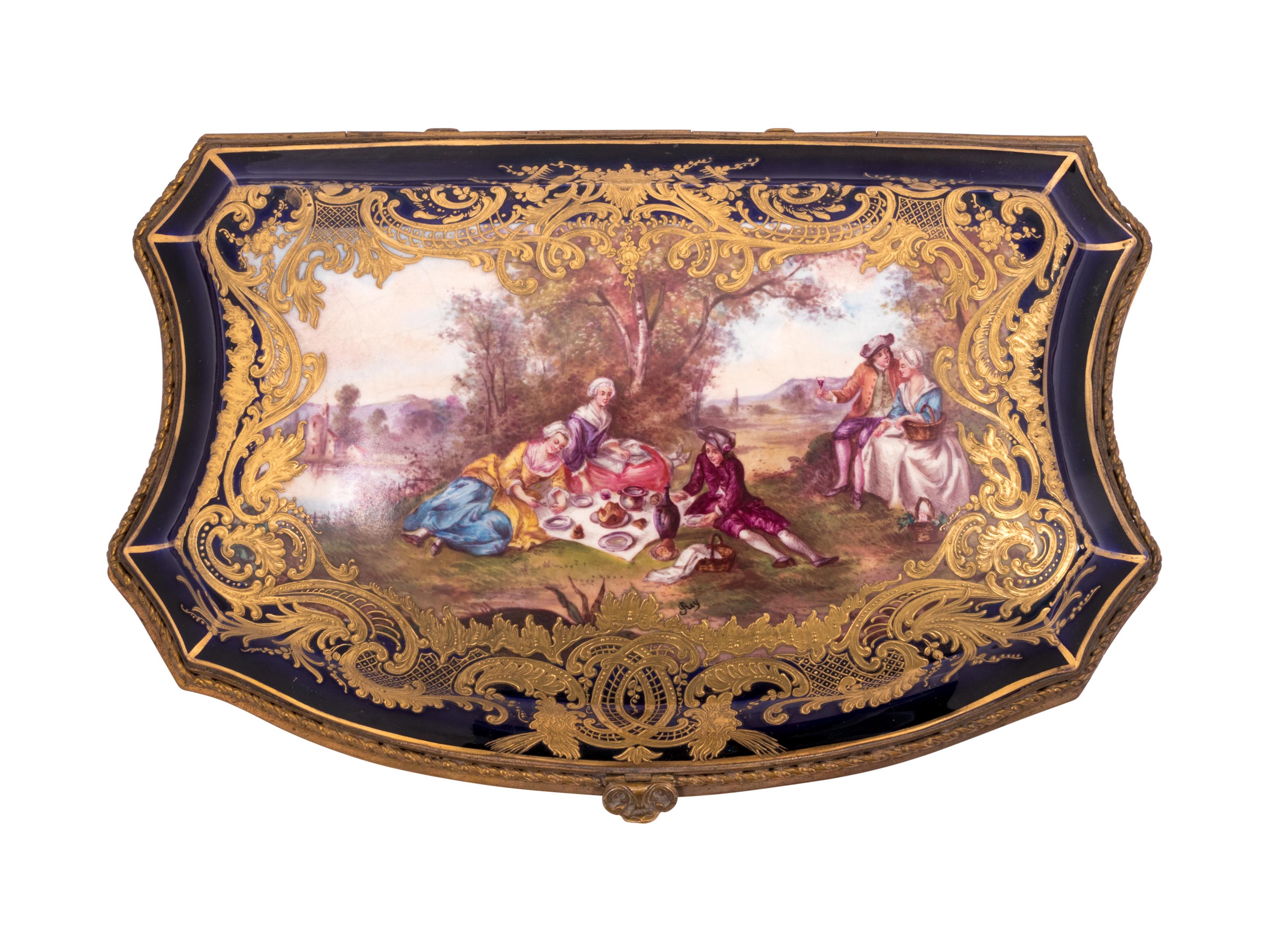A Sèvres Style Painted and Parcel Gilt Porcelain Table Casket